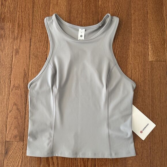 lululemon athletica Tops - Lululemon Nulux Racerback Cropped Run Tank Women’s Size 6 Silver Lightweight NWT